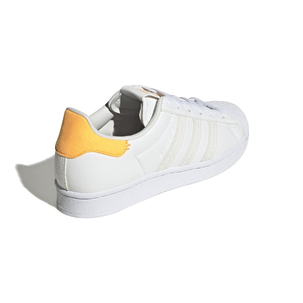 Orange and white adidas superstar online