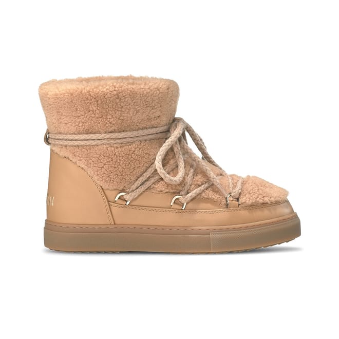 Curly High Snug Boots with Lace-Up Closure