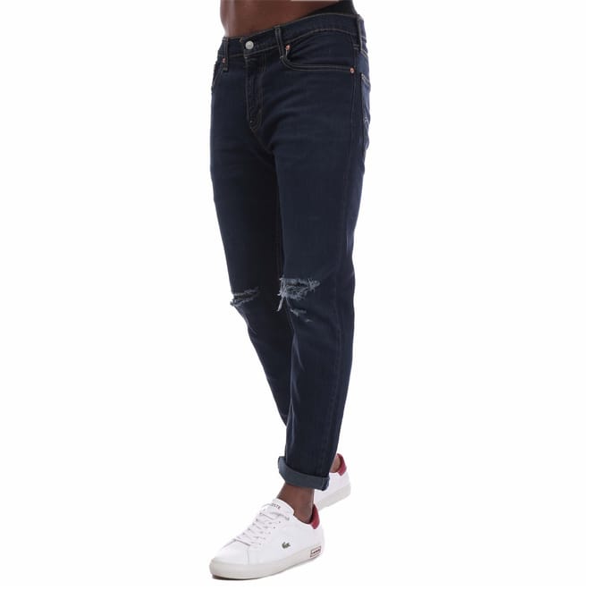502 Distressed Tapered Jeans